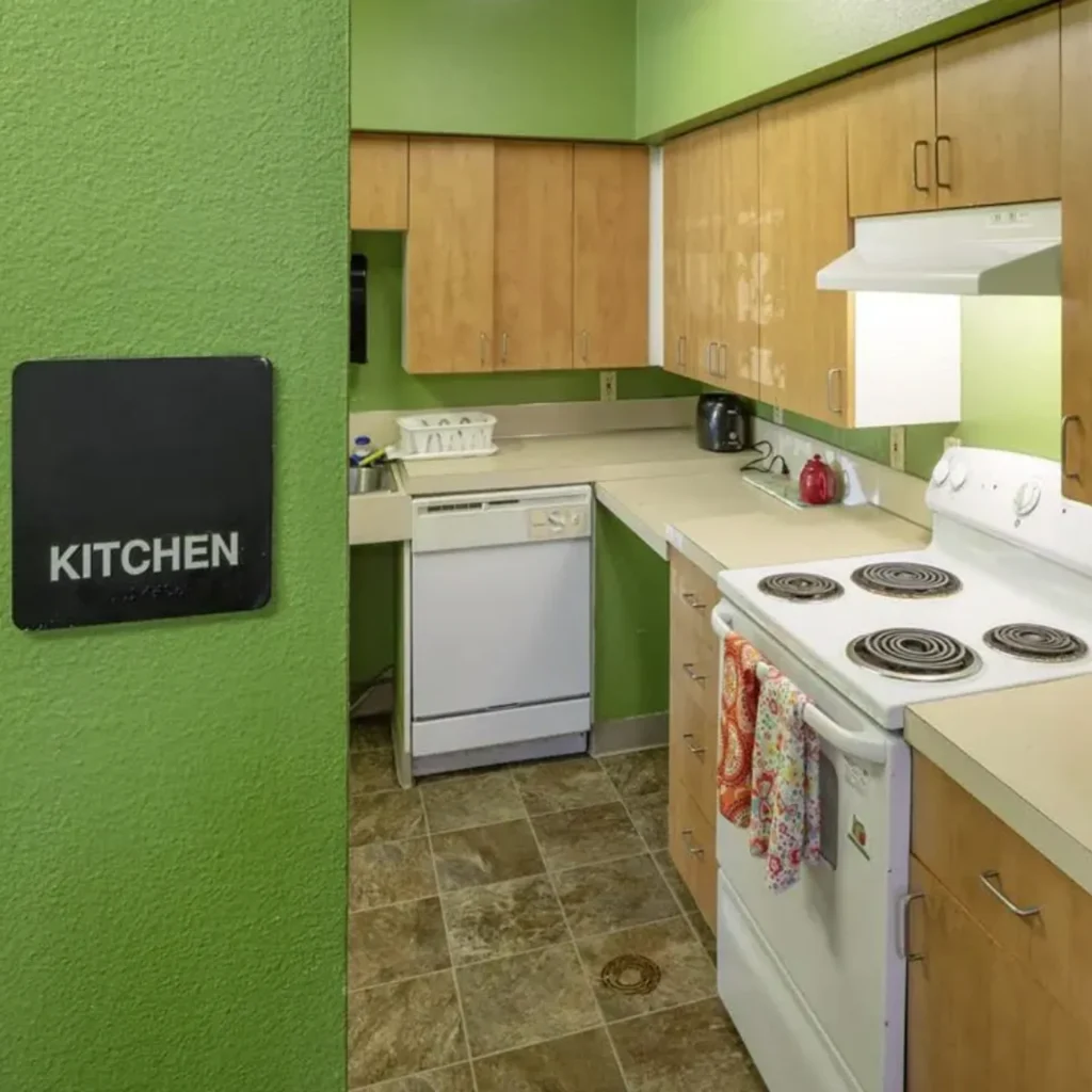 Shared community kitchen at Barbara Maher Apartments