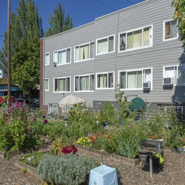 Barbara Maher Apartments exterior with resident community garden